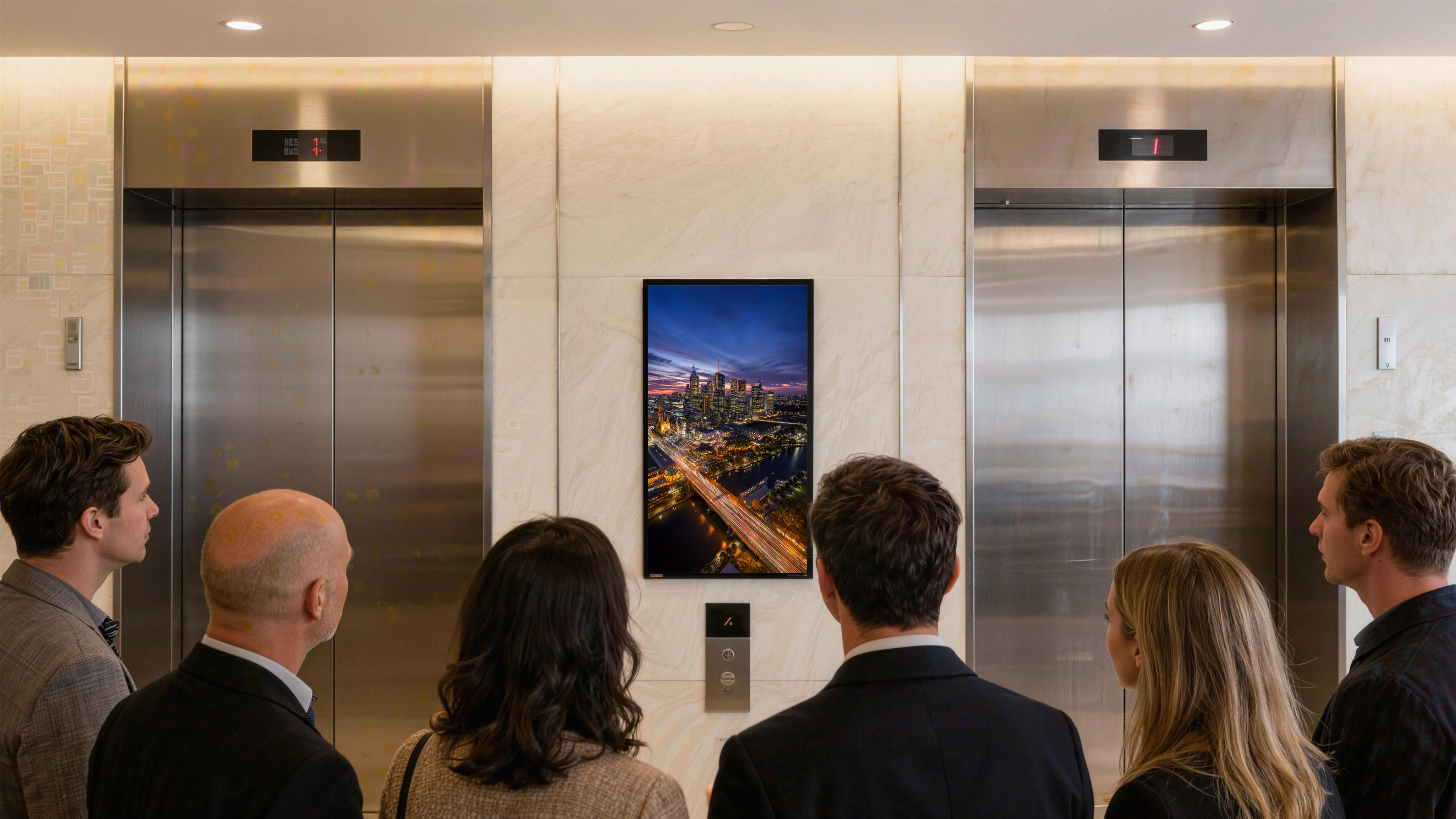 Focus Media screen in a building lift lobby